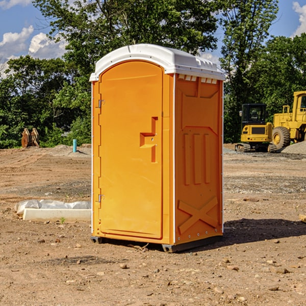 how often are the porta potties cleaned and serviced during a rental period in Topping